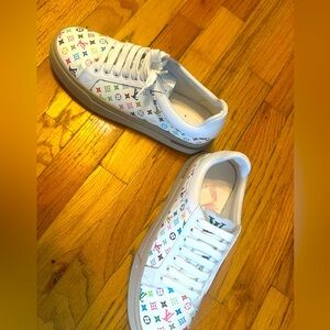 Lv white leather multi colored design sz 10 retails n store 1250 with box auth